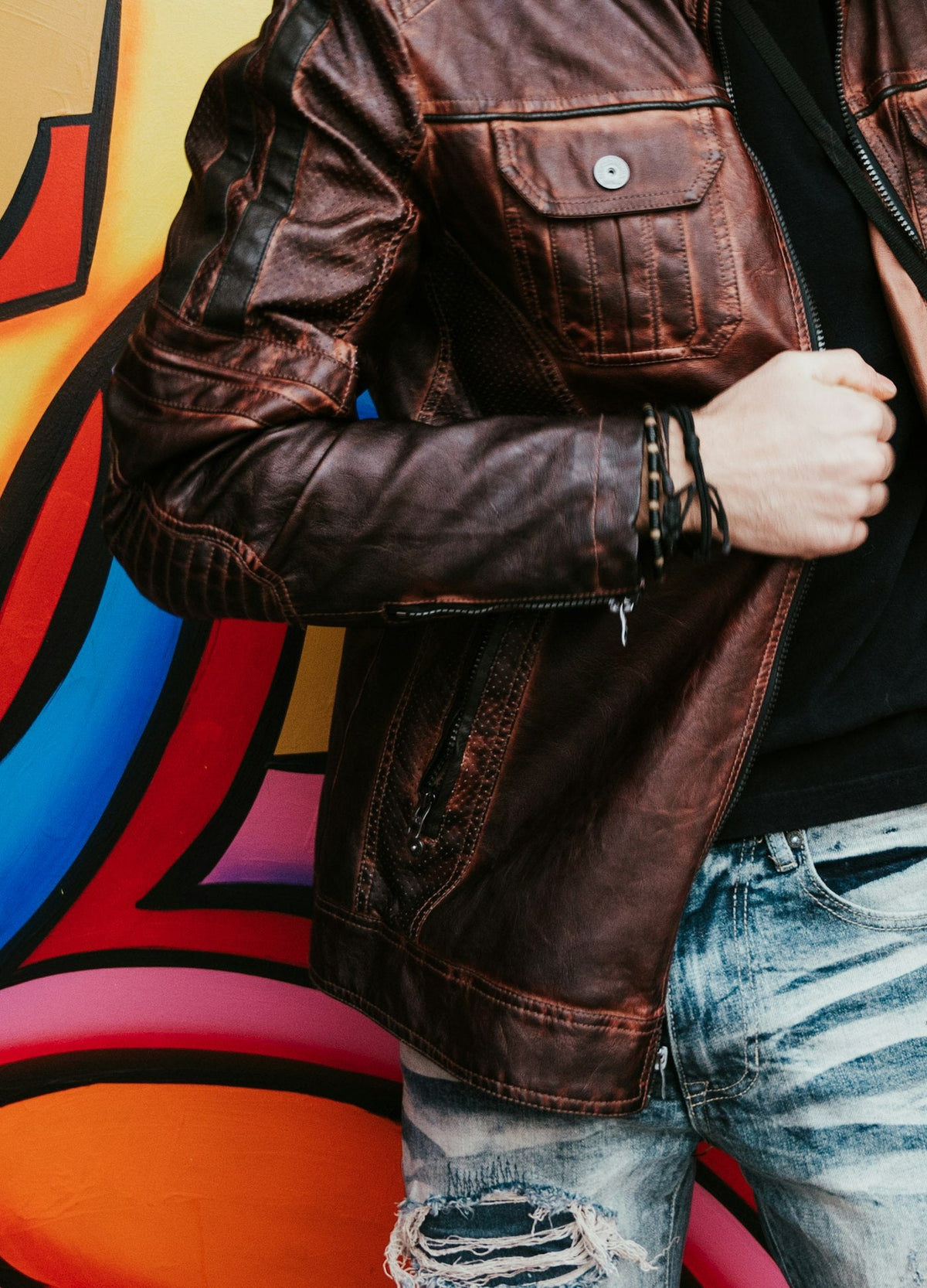 Man in brown leather bomber